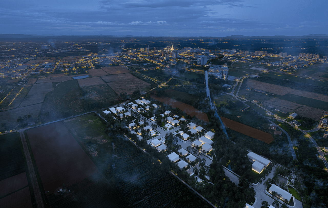 Evening aerial view of the Blueprint Shirdi villas with the town of Shirdi beyond