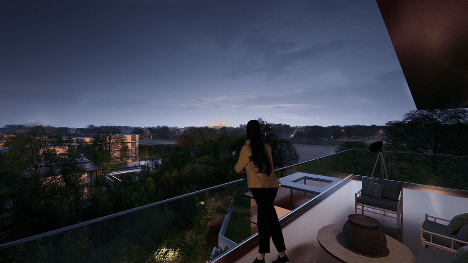 An owner on a private villa terrace at dusk, overlooking Shirdi